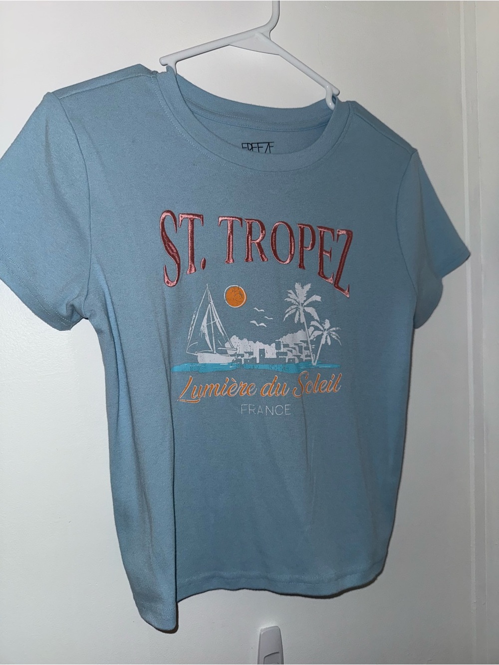 freeze light blue st tropez short sleeve graphic top